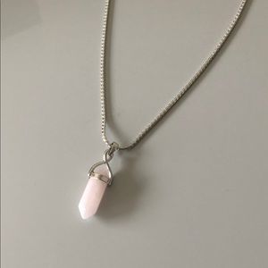 Rose quartz pendant on 18” silver necklace.
